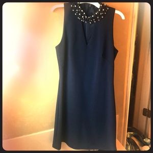 Knee length cocktail dress. Lined.